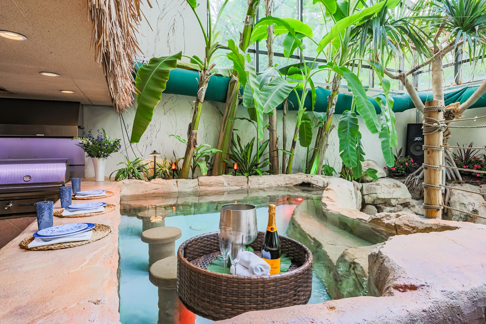 Heated Indoor Pool & Swim-Up Tiki Bar in a Year-Round Tropical Sunroom